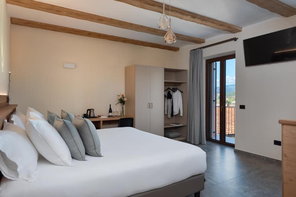 Postel nebo postele na pokoji v ubytování Sporting Hotel San Felice