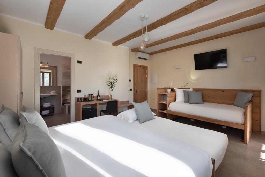 Postel nebo postele na pokoji v ubytování Sporting Hotel San Felice