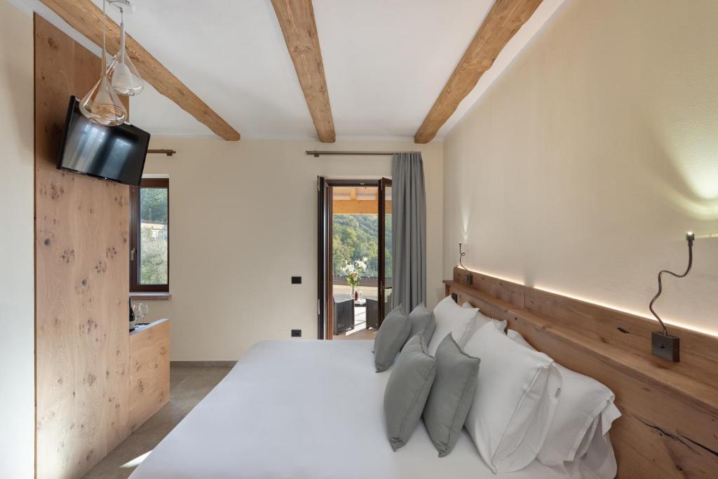 Postel nebo postele na pokoji v ubytování Sporting Hotel San Felice