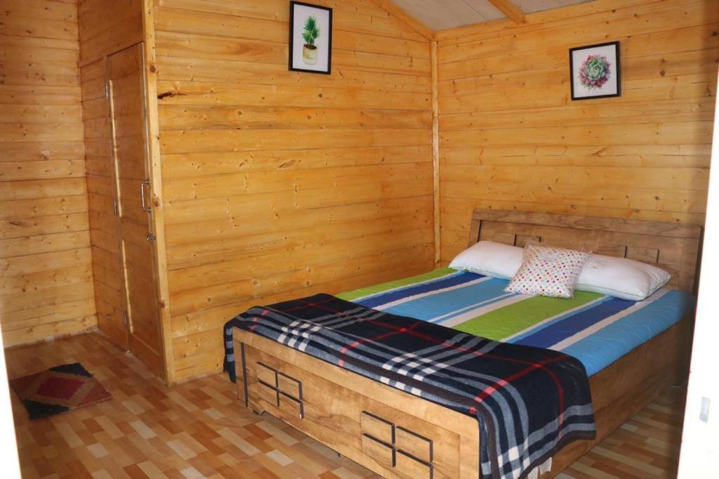 Postel nebo postele na pokoji v ubytování Basho beach Resort