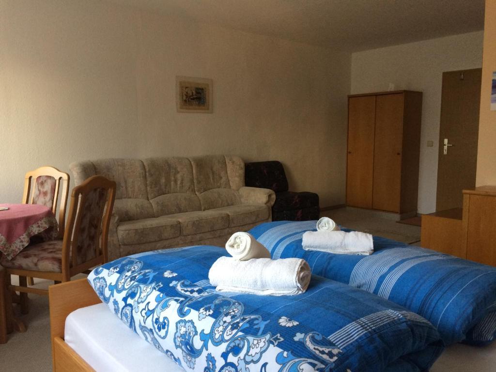 Postel nebo postele na pokoji v ubytování Hotel Stadt Leipzig