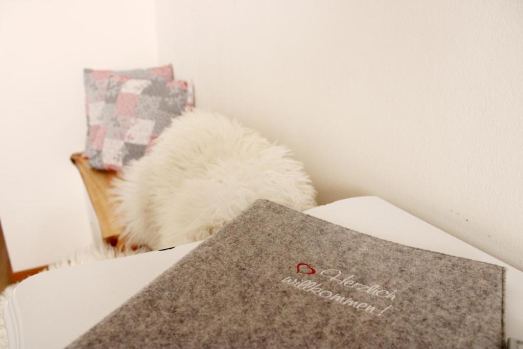 A bed or beds in a room at Riverhaus