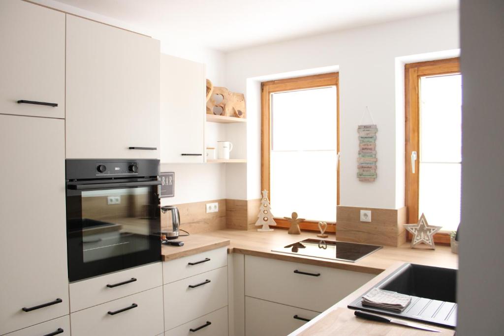 A kitchen or kitchenette at Riverhaus