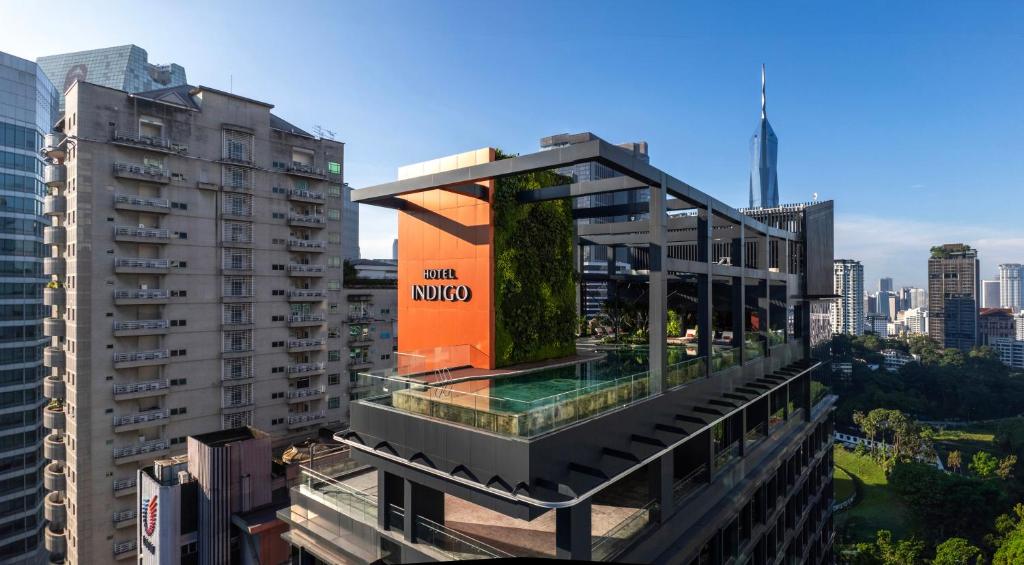 Hotel Indigo Kuala Lumpur guest room with skyline view