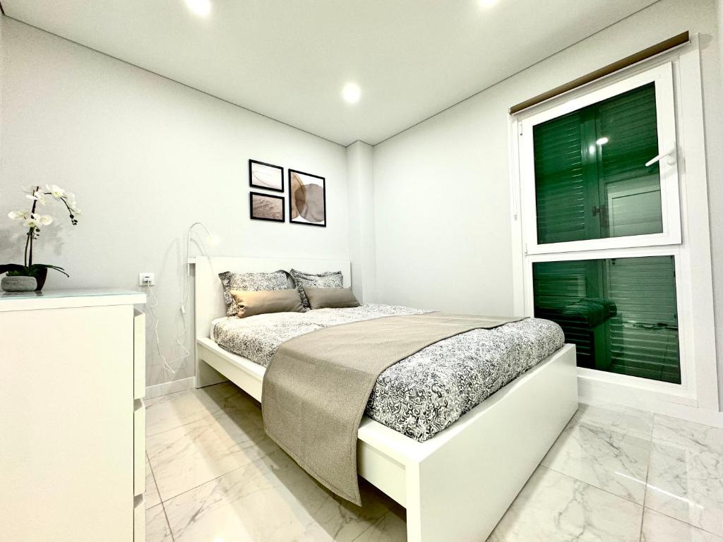 Postel nebo postele na pokoji v ubytování Las Viñas Apartment