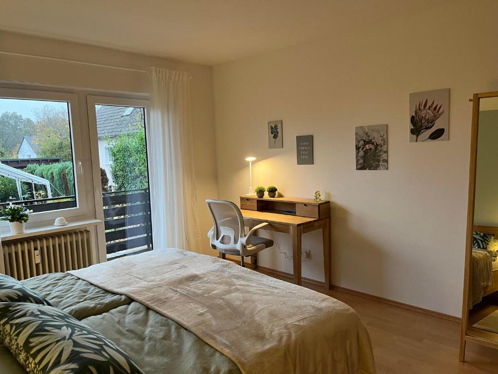 Postel nebo postele na pokoji v ubytování Hennen-Nest
