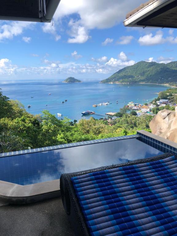 a view of the ocean from a resort balcony at Ocean View Villa in Ko Tao