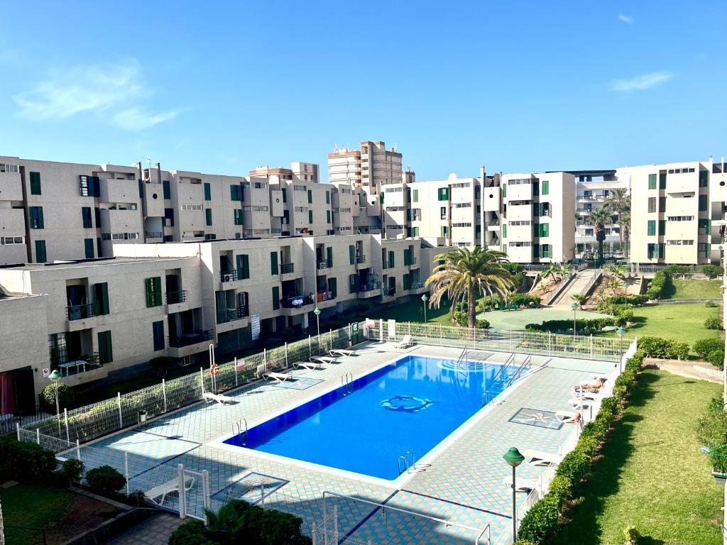 Bazén v ubytování Las Viñas Apartment nebo v jeho okolí