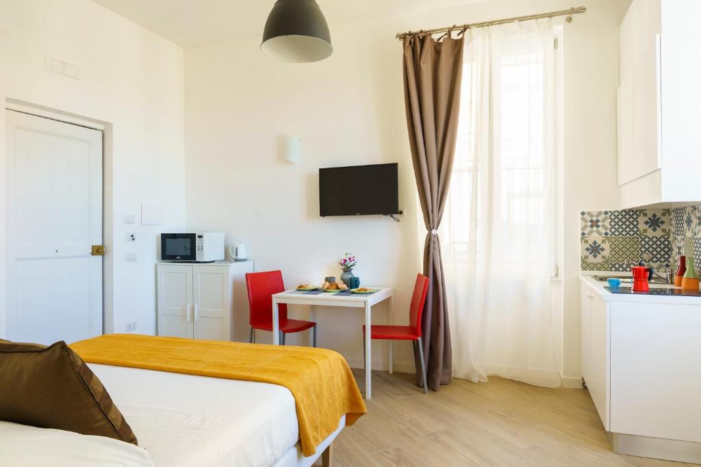 TV a/nebo společenská místnost v ubytování Palazzo Olivieri Amalfi Coast