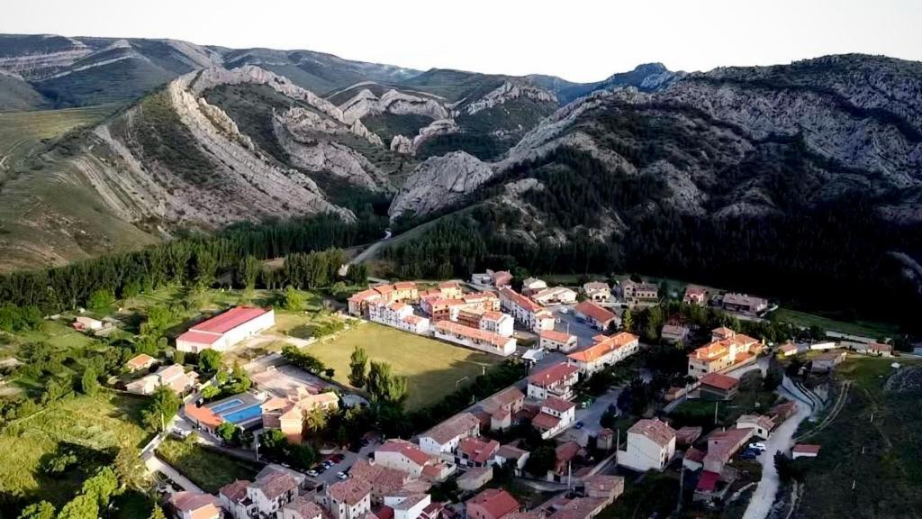 an aerial view of a village in the mountains at Apartamento JUMIDOSIV in Aliaga
