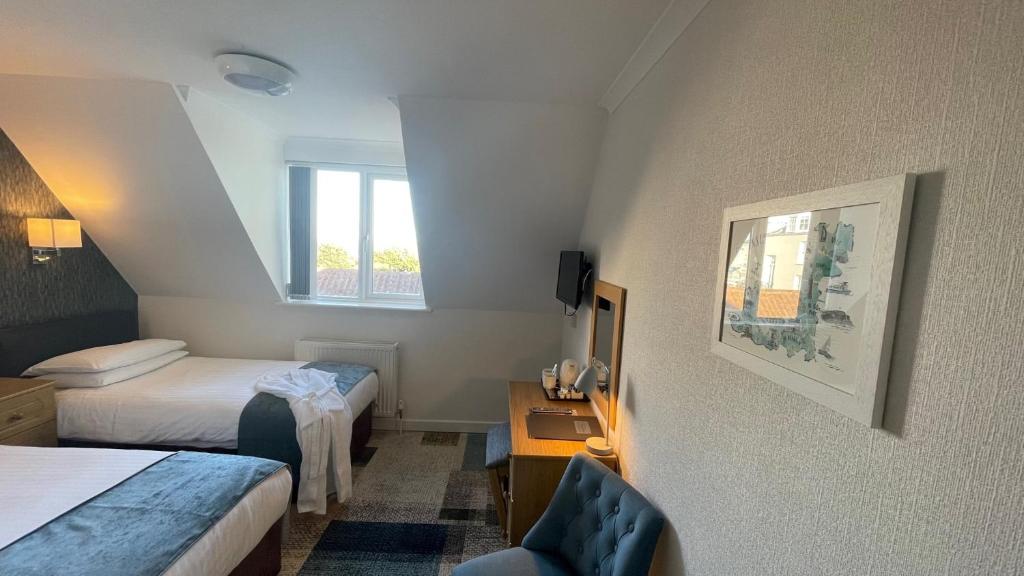Postel nebo postele na pokoji v ubytování Pandora Hotel