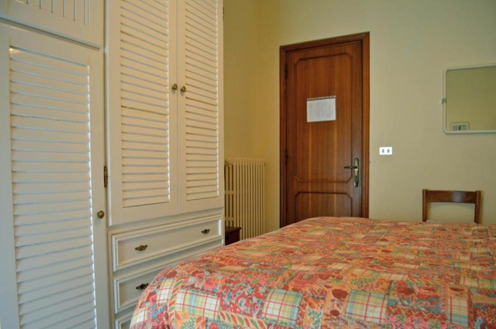 Postel nebo postele na pokoji v ubytování La Ozza B&B