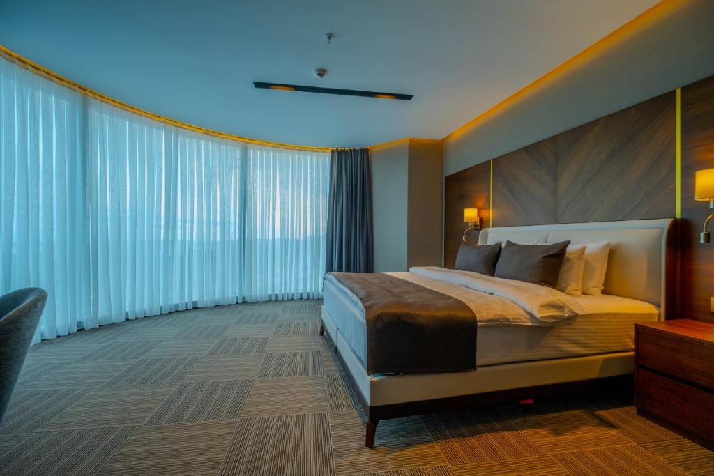 Postel nebo postele na pokoji v ubytování B'İSTANBUL HOTEL