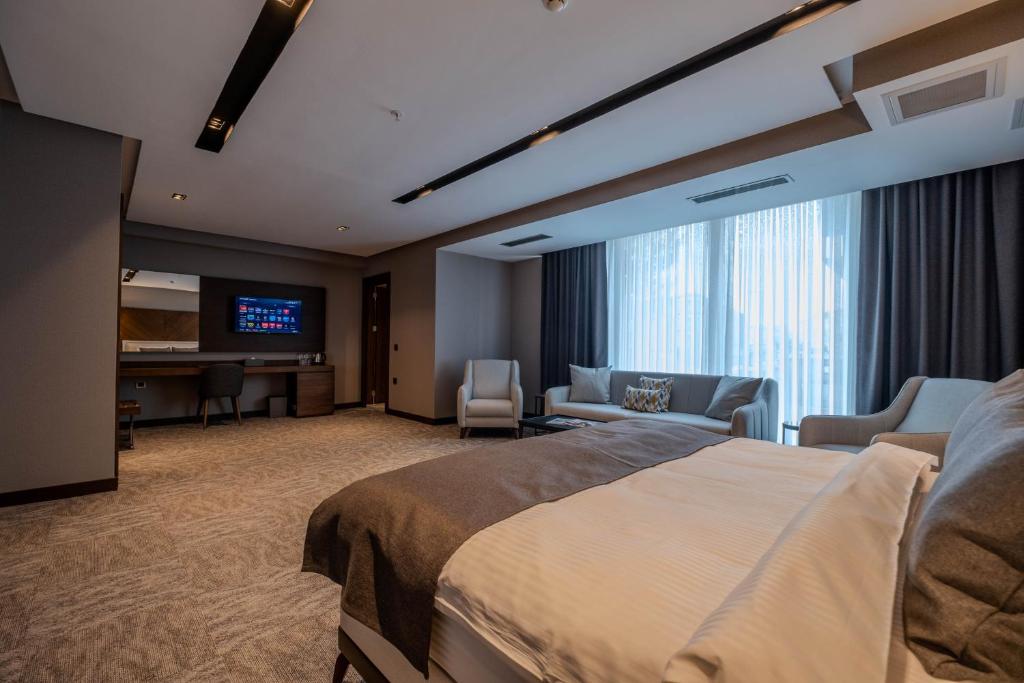 Postel nebo postele na pokoji v ubytování B'İSTANBUL HOTEL