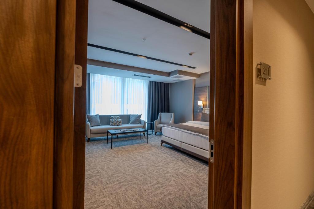 Postel nebo postele na pokoji v ubytování B'İSTANBUL HOTEL