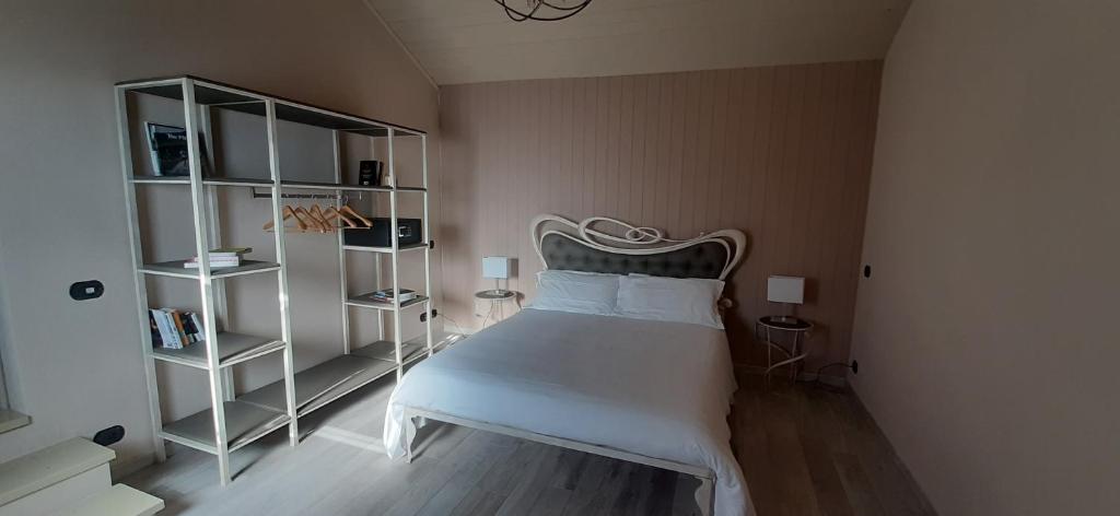 Postel nebo postele na pokoji v ubytování Casale Raffaello B&B Como