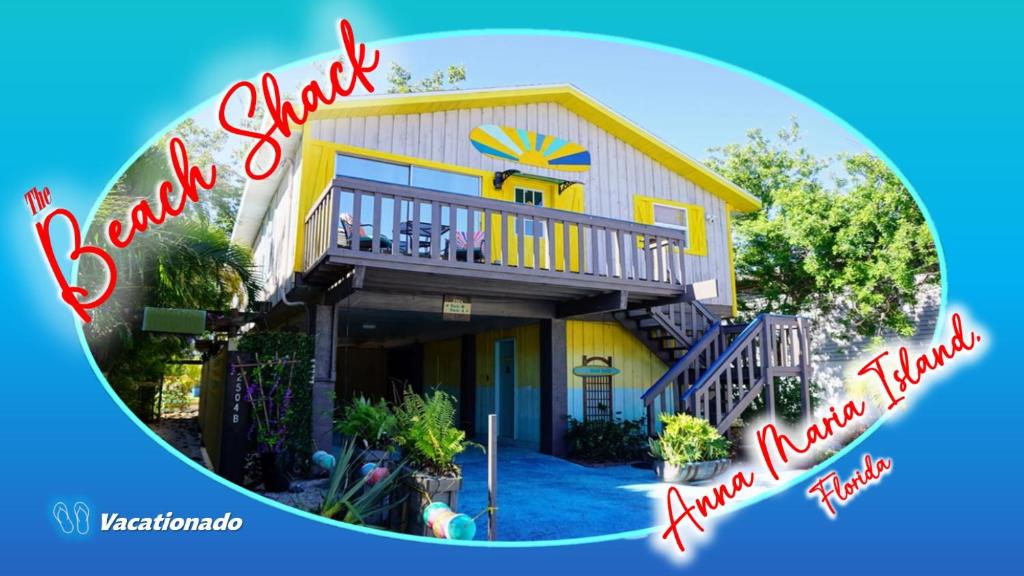a picture of a yellow house with the words okayoyaoya ballet at Ami Beach Shack in Bradenton Beach