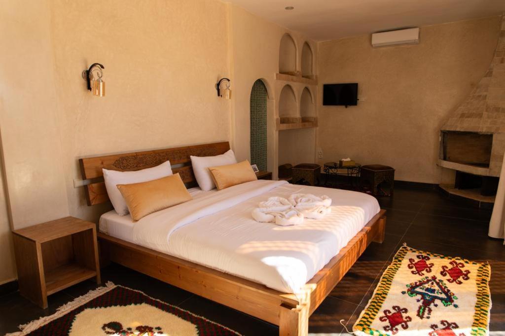 Postel nebo postele na pokoji v ubytování Maison D'hôtes IMINIGRAN & Spa