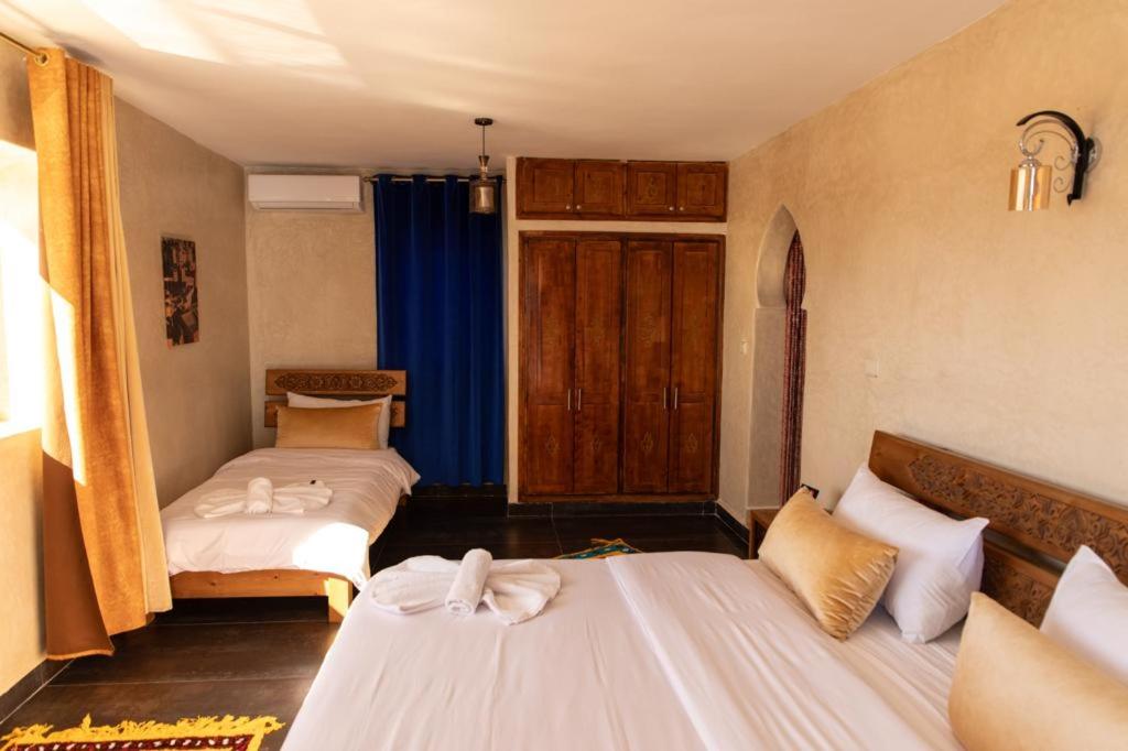 Postel nebo postele na pokoji v ubytování Maison D'hôtes IMINIGRAN & Spa