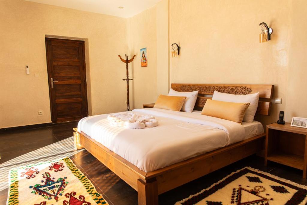 Postel nebo postele na pokoji v ubytování Maison D'hôtes IMINIGRAN & Spa