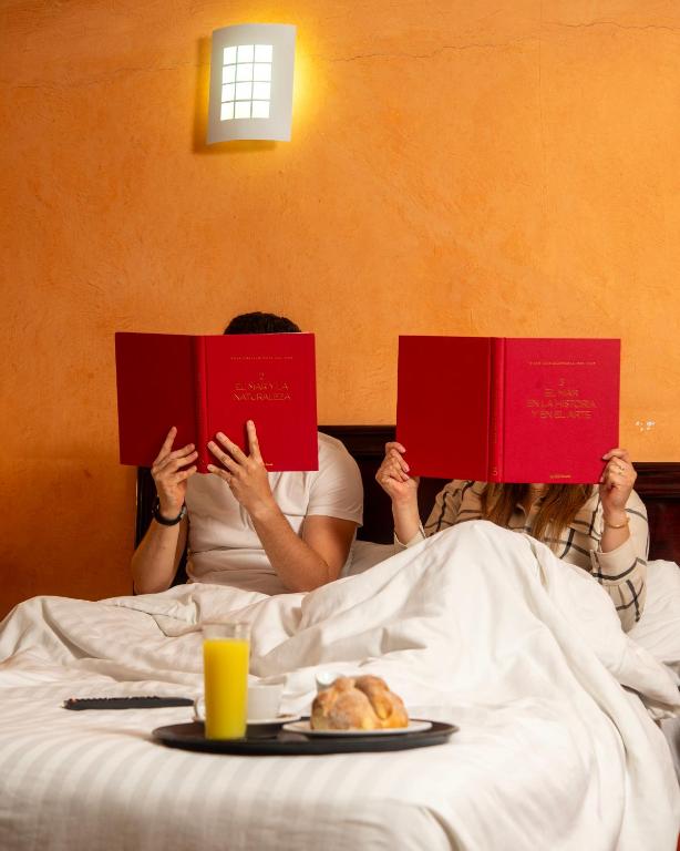 Postel nebo postele na pokoji v ubytování Hotel Atenas