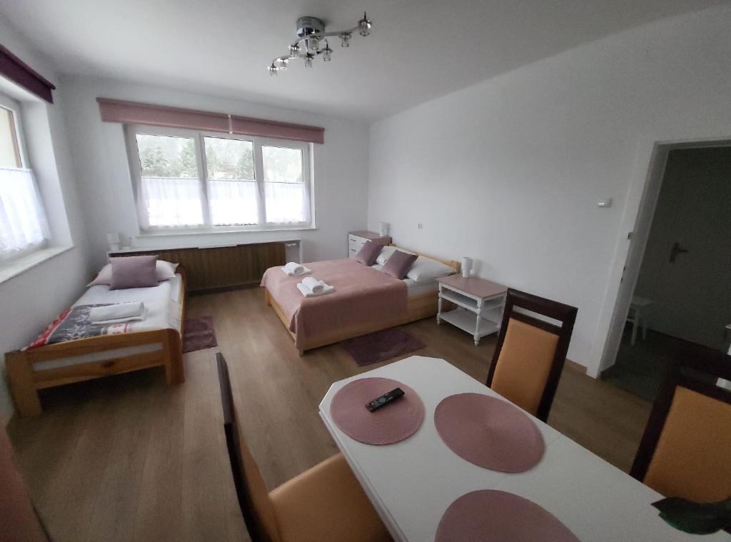 Postel nebo postele na pokoji v ubytování Blueberry