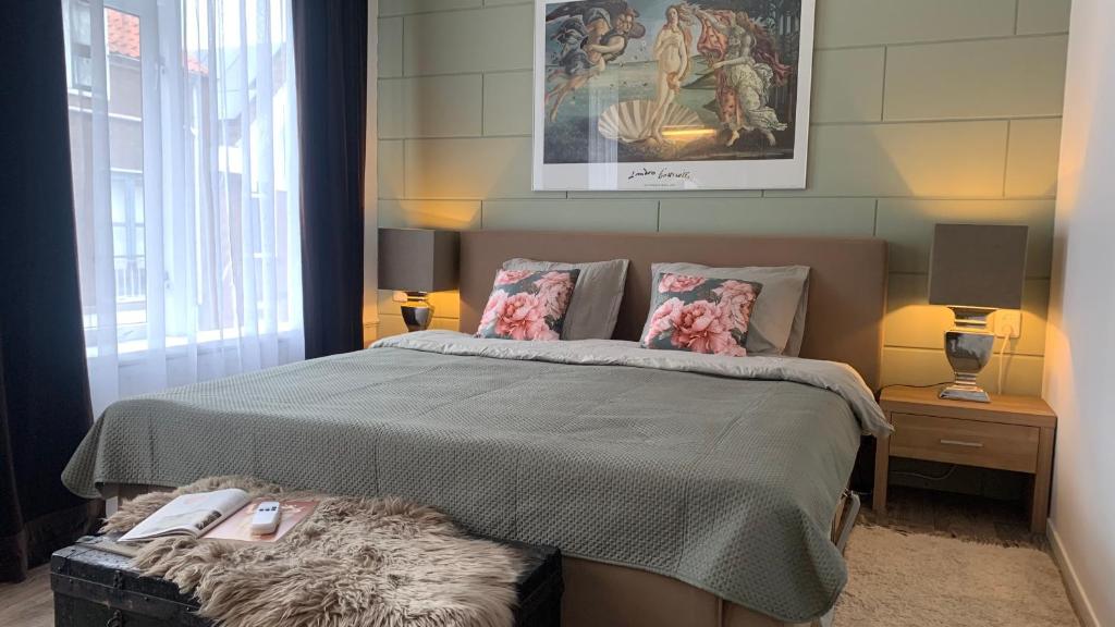 Ένα ή περισσότερα κρεβάτια σε δωμάτιο στο Cityhouse Vincent