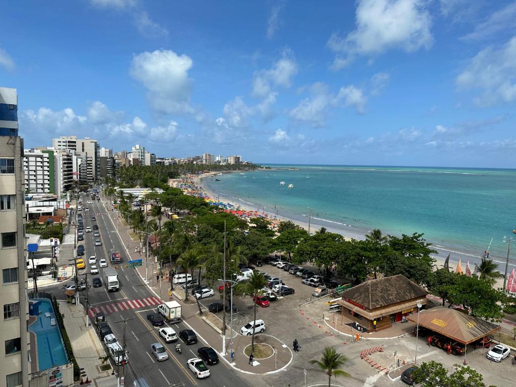 a view of a beach and the ocean at Neo 2.0 in Maceió