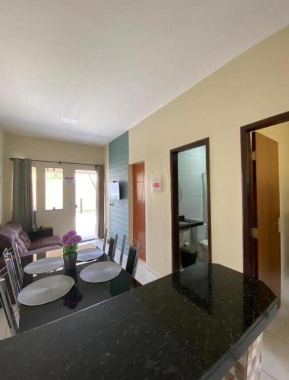 Postel nebo postele na pokoji v ubytování Lençóis Dunas Residence 1
