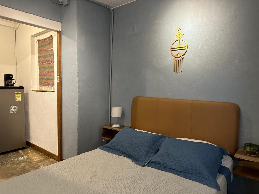 Postel nebo postele na pokoji v ubytování Hotel Casa Lucca