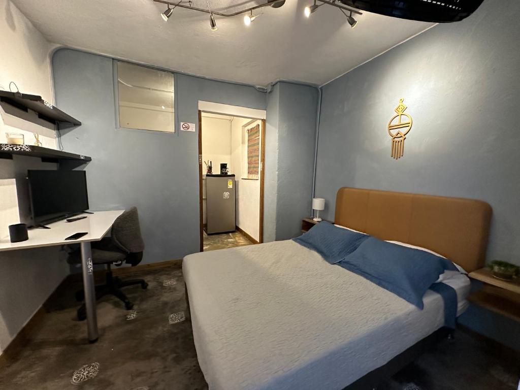 Postel nebo postele na pokoji v ubytování Hotel Casa Lucca