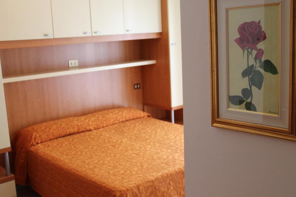 Postel nebo postele na pokoji v ubytování Hotel Kennedy