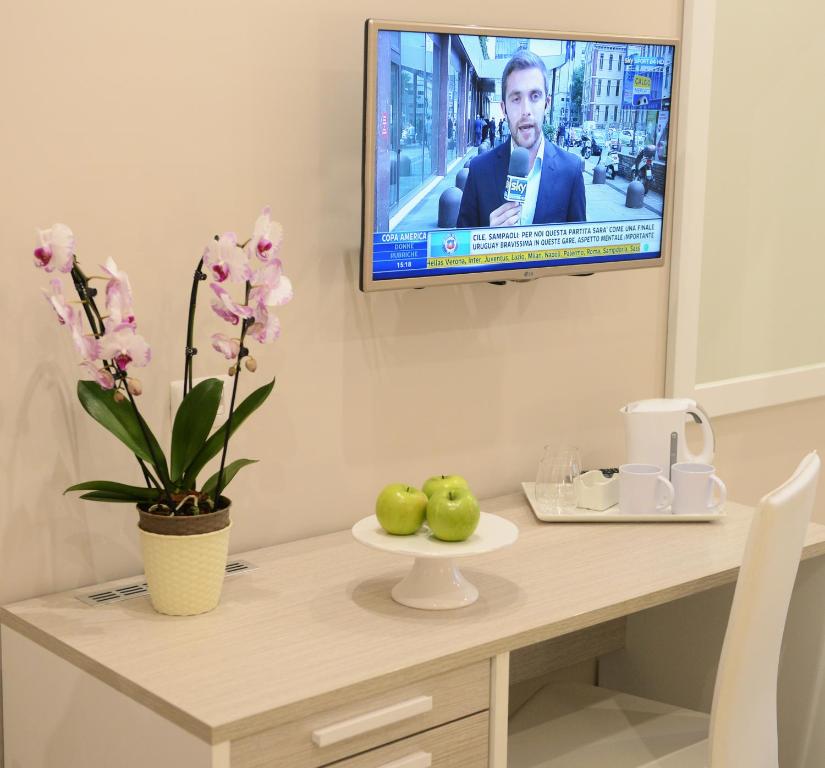TV a/nebo společenská místnost v ubytování Le Quattro Piazze