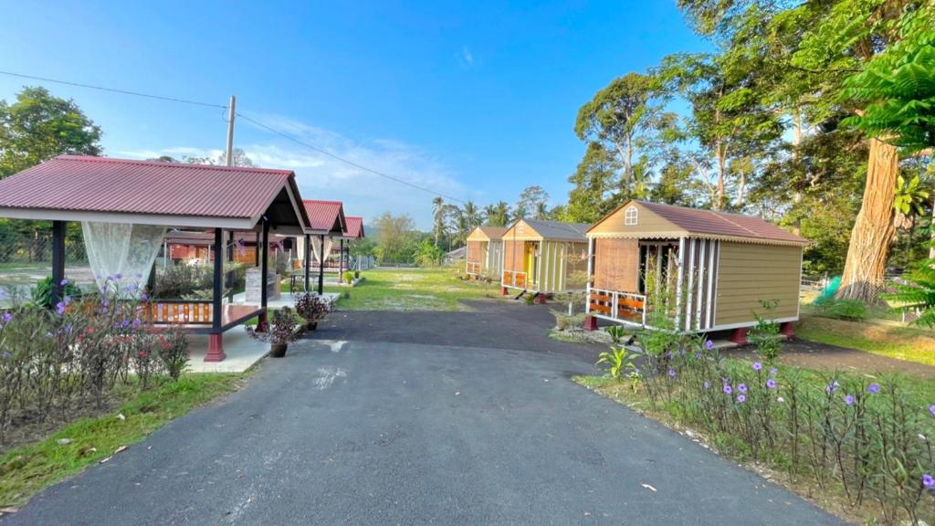 a row of mobile homes in a park at Laman Cottage @ Brisu, Melaka in Melaka