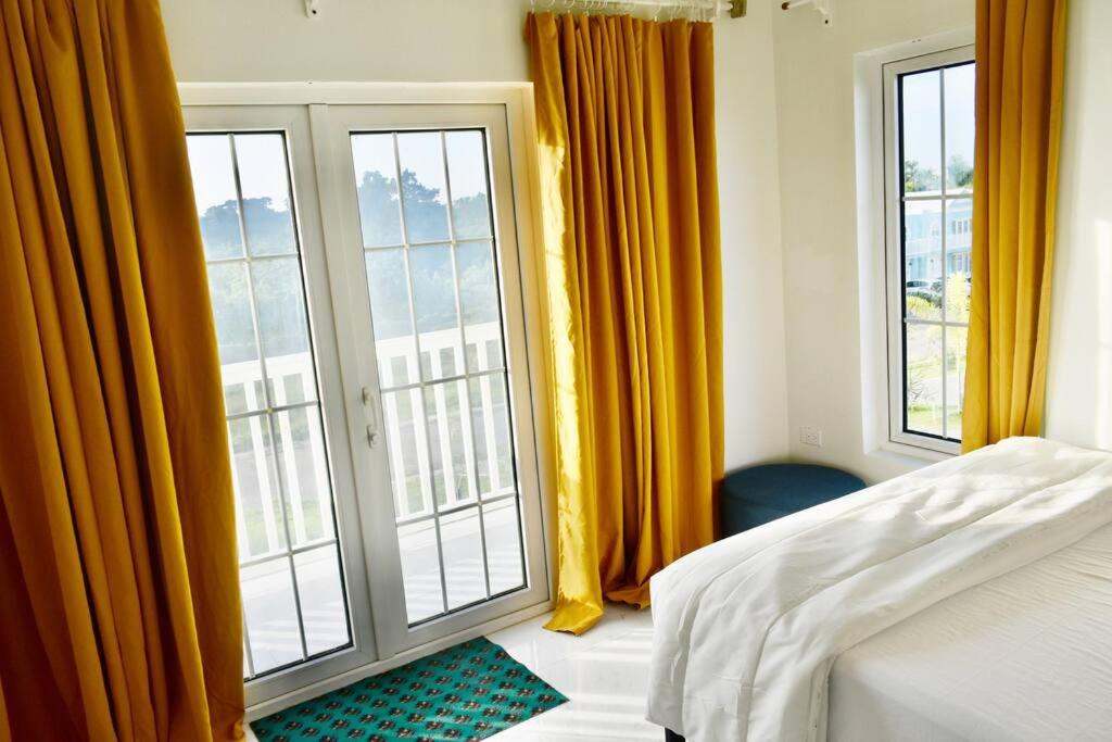 Postel nebo postele na pokoji v ubytování Irie Vibes Ocean View