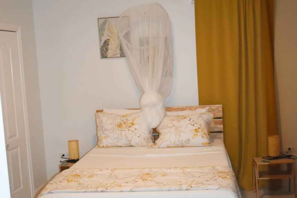 Postel nebo postele na pokoji v ubytování Irie Vibes Ocean View
