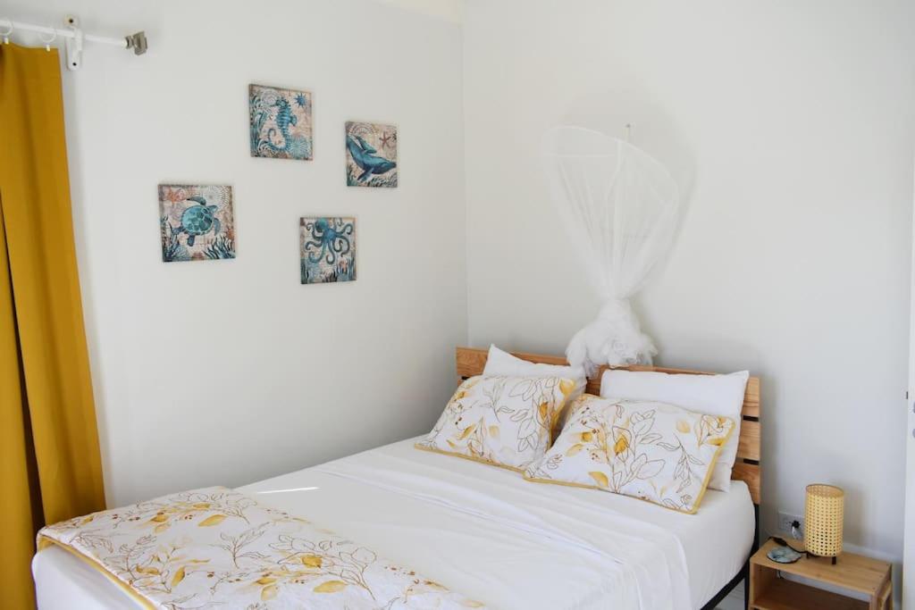Postel nebo postele na pokoji v ubytování Irie Vibes Ocean View