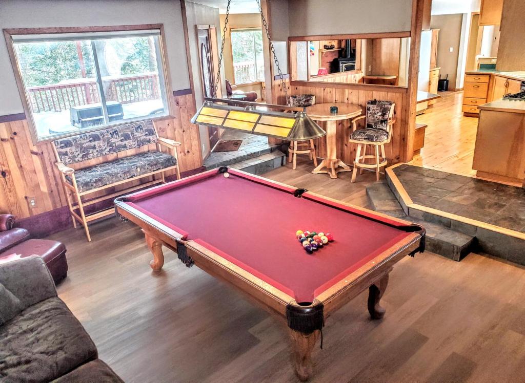 a pool table in the middle of a living room at Hot Tub Pool Table Mountain Views Large Redwood Decks near Best Beaches Heavenly Ski Area and Casinos 9 in Stateline