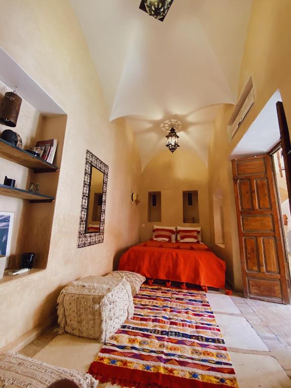 Postel nebo postele na pokoji v ubytování Riad Sidi Radoine