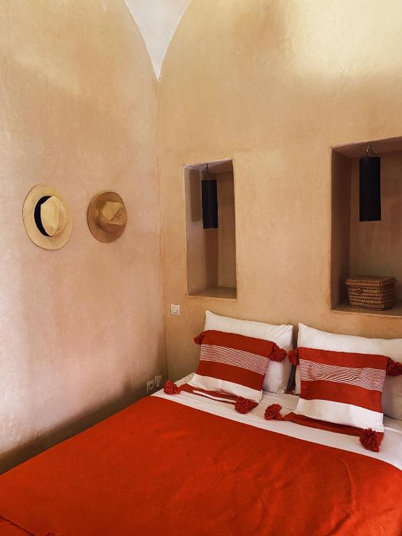 Postel nebo postele na pokoji v ubytování Riad Sidi Radoine