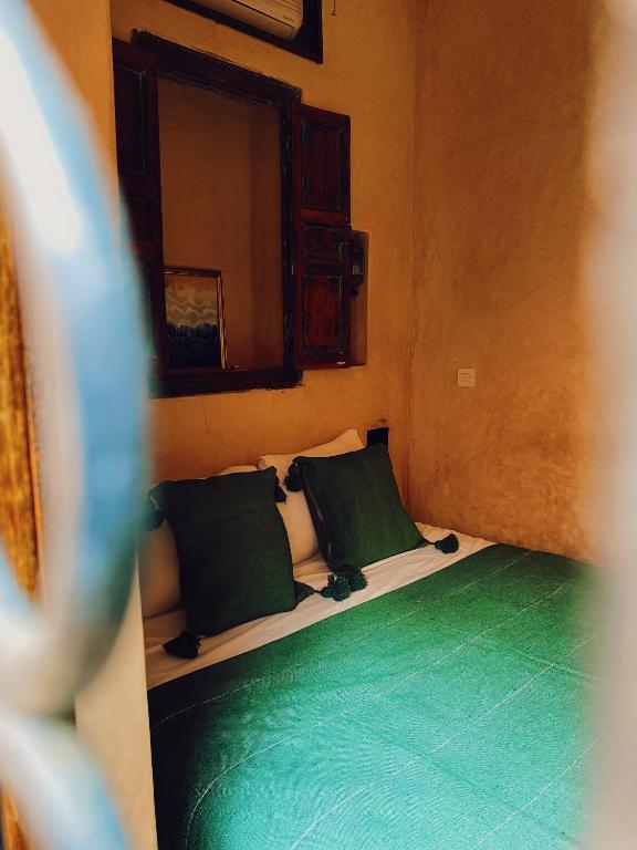 Postel nebo postele na pokoji v ubytování Riad Sidi Radoine