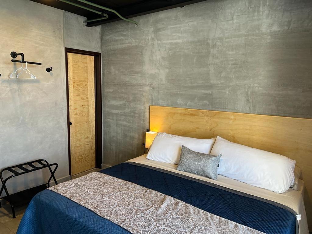 Postel nebo postele na pokoji v ubytování Hotel Ciclovía & Terraza