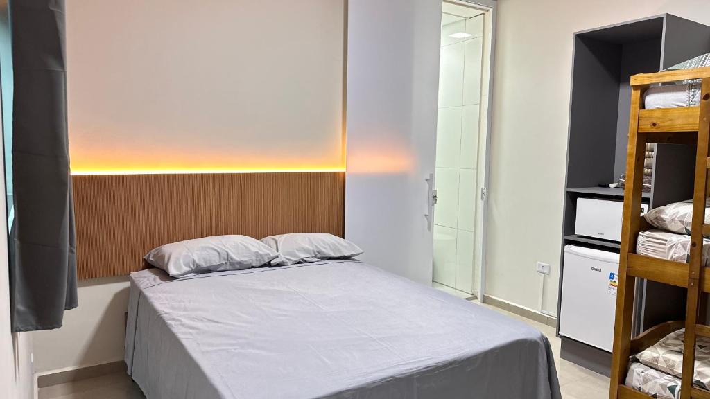 Postel nebo postele na pokoji v ubytování Guaru Inn Hostel