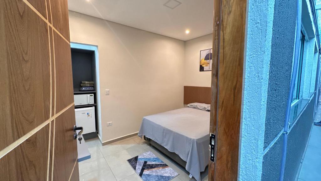 Postel nebo postele na pokoji v ubytování Guaru Inn Hostel
