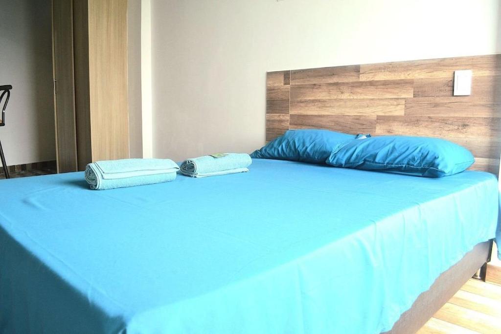 En eller flere senger på et rom på Encantadora Suite - Santa Elena