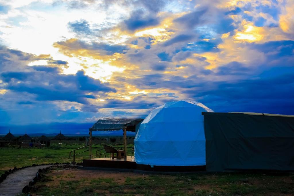 Východ nebo západ slunce při pohledu z luxury tent nebo okolí