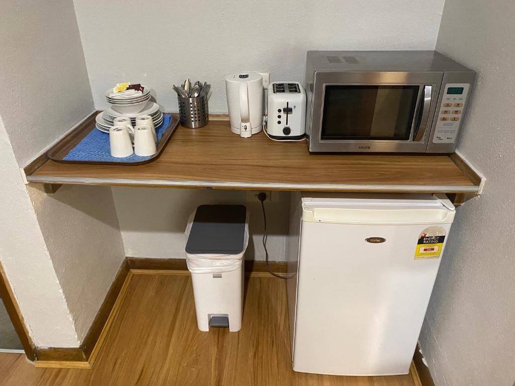 Kuchyň nebo kuchyňský kout v ubytování Tollgate Motel