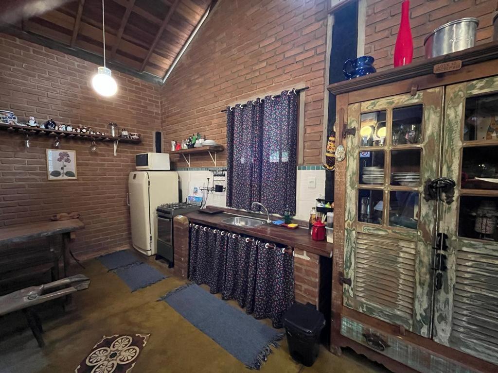 Dapur atau dapur kecil di Casa da Lilica