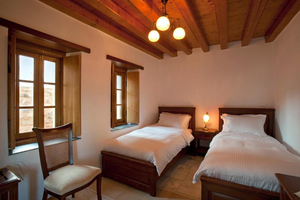 Postel nebo postele na pokoji v ubytování Likinia Hotel