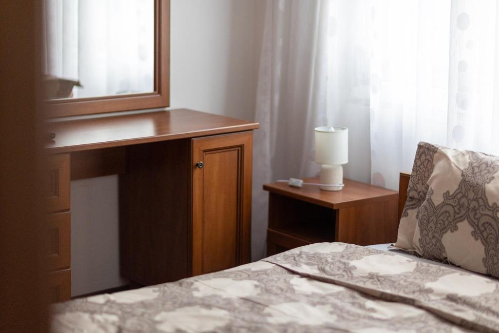 Postel nebo postele na pokoji v ubytování Karastoyanovi's apartment 3